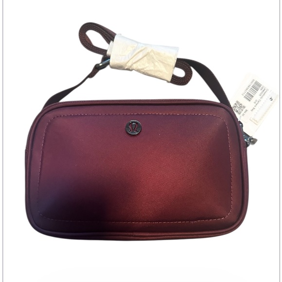 lululemon athletica Handbags - Lululemon 2L Camera Crossbody Bag in CASSIS Gunmetal Hardware NWT